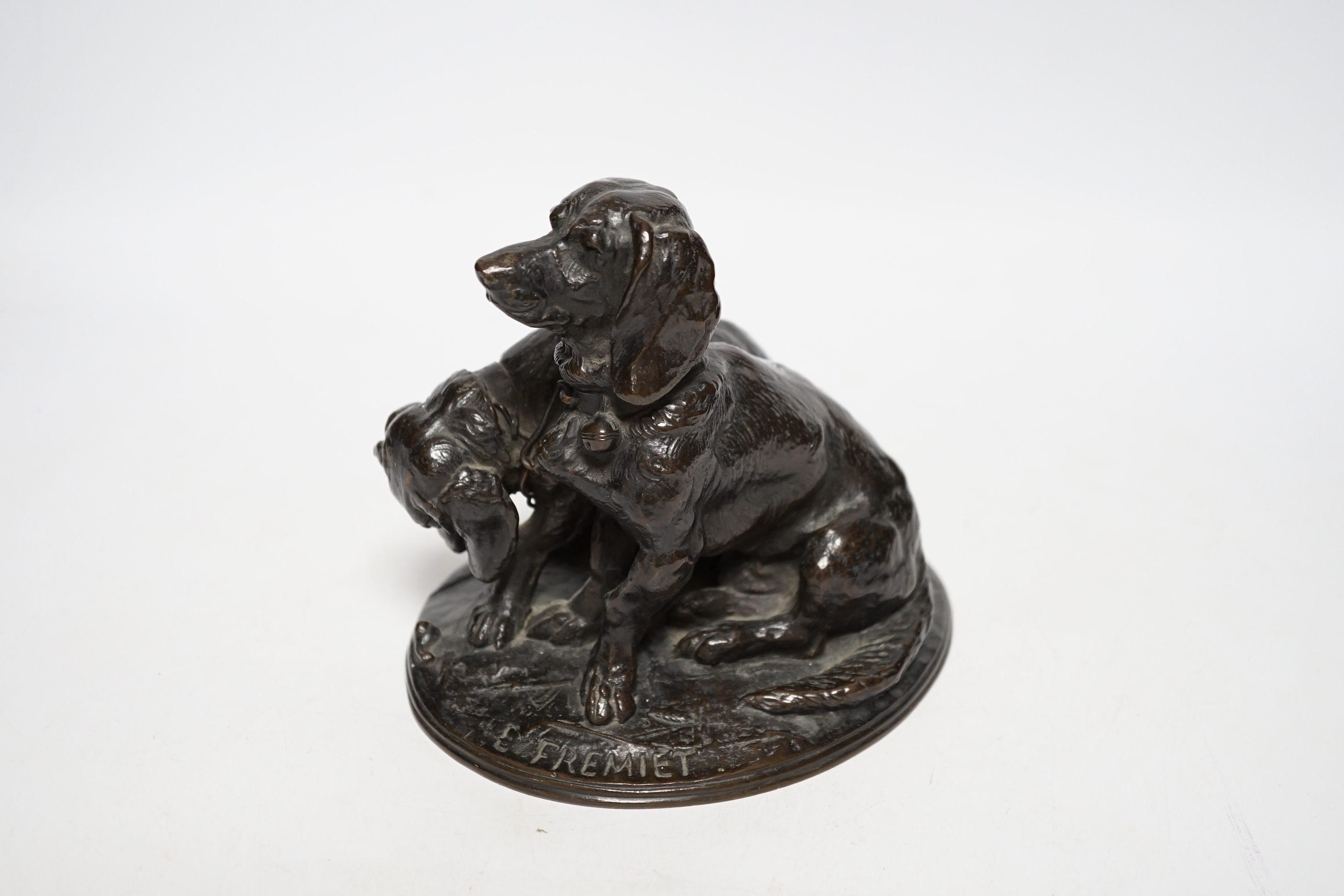 After Emmanuel Fremiet (1824-1910), a bronze group of spaniels, 14cm